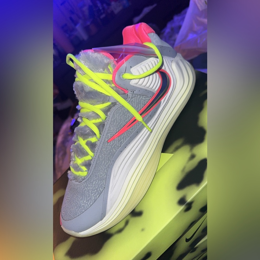 Nike Gray Sneaker with Neon Yellow Laces and Pink Accents